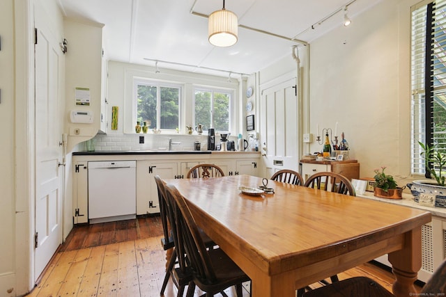 2 Summit St, Stonington, CT 06378 - dining room featuring light wood-type flooring and rail lighting