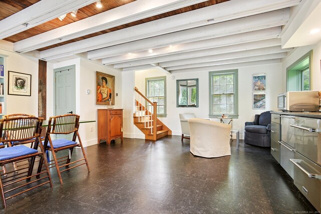 2 Summit St, Stonington, CT 06378 - living area with stairway, tile patterned floors, a wood ceiling with exposed beams, and healthy amount of natural light