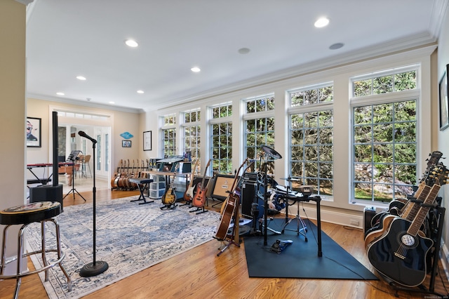 249 Sturges Hwy, Westport, CT 06880 - workout room featuring crown molding, healthy amount of natural light, wood finished floors, and recessed lighting
