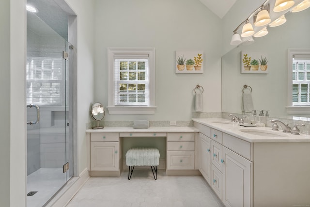 249 Sturges Hwy, Westport, CT 06880 - bathroom with a stall shower, plenty of natural light, double vanity, and lofted ceiling