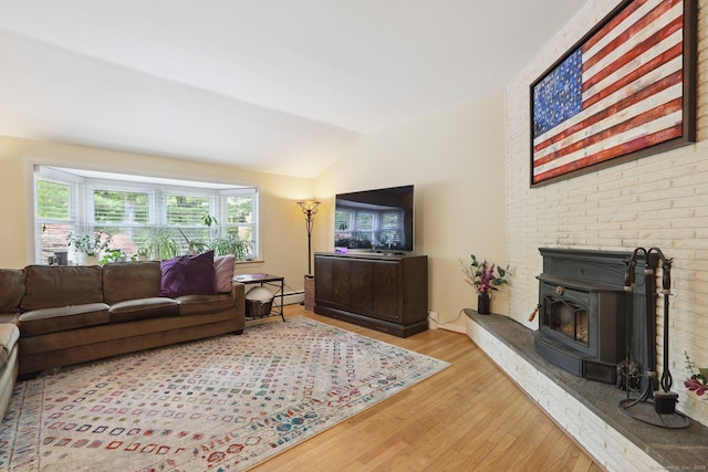 81 Park Rd, Woodbury, CT 06798 - living room with vaulted ceiling, wood finished floors, and baseboard heating