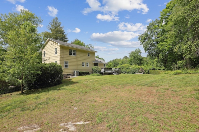 81 Park Rd, Woodbury, CT 06798 - view of green lawn featuring a wooden deck and central AC