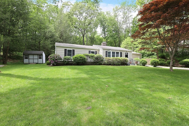 28 Shields Ln, Ridgefield, CT 06877 - view of front of home with a chimney, a front lawn, and view of wooded area