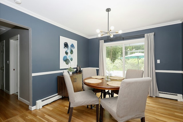 28 Shields Ln, Ridgefield, CT 06877 - dining room with a baseboard heating unit, a chandelier, light wood-style floors, and crown molding