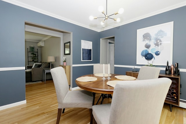 28 Shields Ln, Ridgefield, CT 06877 - dining room featuring a wall mounted AC, ornamental molding, light wood-style floors, a chandelier, and baseboards