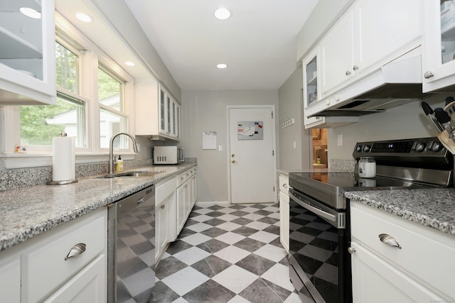 28 Shields Ln, Ridgefield, CT 06877 - kitchen with stainless steel appliances, a sink, light flooring, white cabinetry, and glass insert cabinets