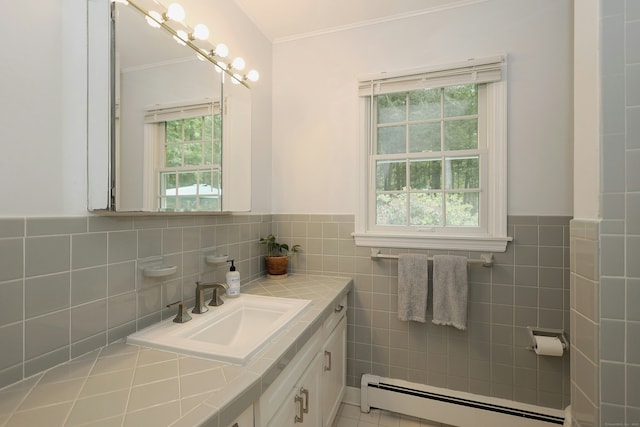 28 Shields Ln, Ridgefield, CT 06877 - bathroom featuring a baseboard radiator, vanity, ornamental molding, tile walls, and wainscoting