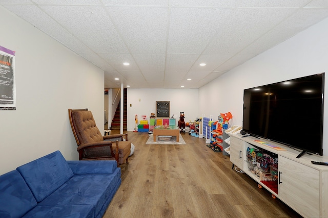 28 Shields Ln, Ridgefield, CT 06877 - living area featuring wood finished floors, recessed lighting, stairway, and a paneled ceiling