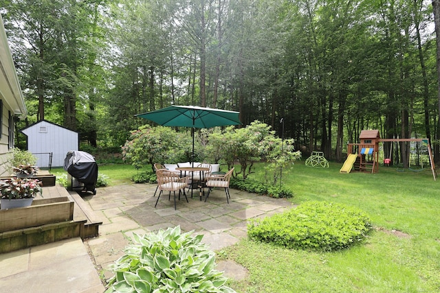 28 Shields Ln, Ridgefield, CT 06877 - view of patio with a grill, a playground, and outdoor dining space