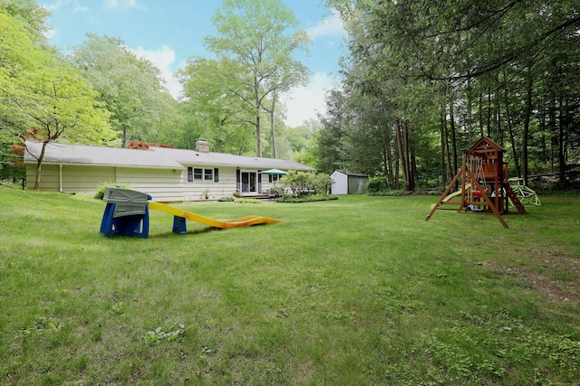 28 Shields Ln, Ridgefield, CT 06877 - view of grassy yard featuring a playground