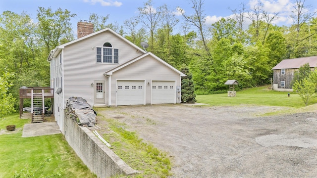 290 Amity Rd, Bethany, CT 06524 - view of front of house with stairs, a chimney, a front lawn, a deck, and a garage