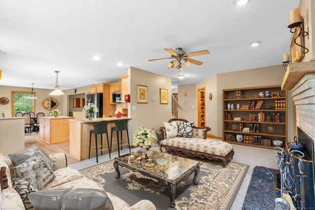 290 Amity Rd, Bethany, CT 06524 - living room with a ceiling fan, a brick fireplace, and recessed lighting