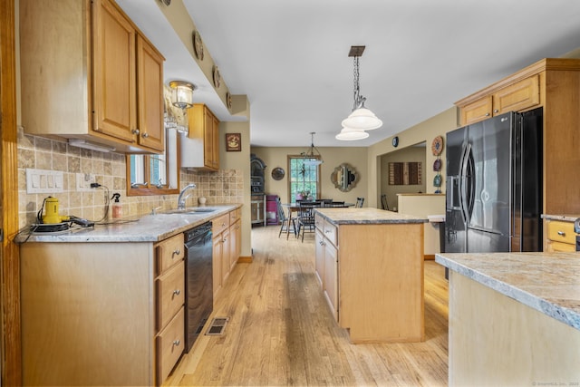 290 Amity Rd, Bethany, CT 06524 - kitchen featuring refrigerator with ice dispenser, a kitchen island, light wood finished floors, a sink, and light countertops