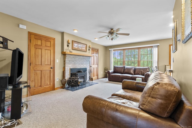 290 Amity Rd, Bethany, CT 06524 - carpeted living room with a ceiling fan, a wood stove, and baseboards