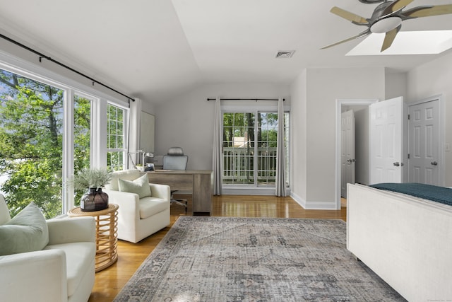 1795 Wolcott Rd, Wolcott, CT 06716 - living area with ceiling fan, a desk, wood finished floors, and vaulted ceiling