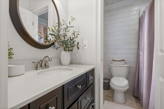 1795 Wolcott Rd, Wolcott, CT 06716 - full bathroom featuring vanity, toilet, and wood walls
