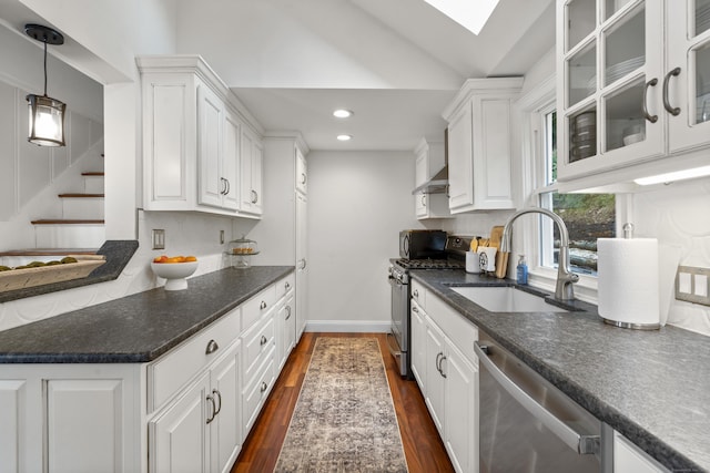 1795 Wolcott Rd, Wolcott, CT 06716 - kitchen with stainless steel appliances, a sink, white cabinets, and recessed lighting