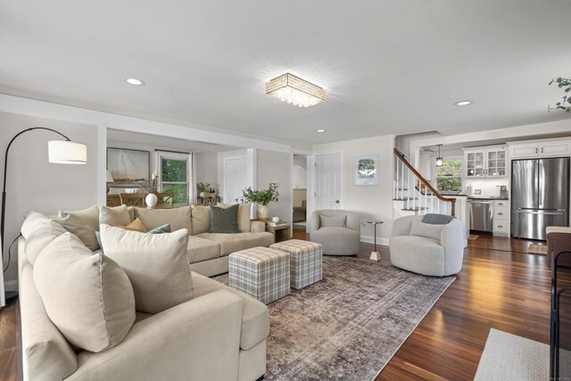 1795 Wolcott Rd, Wolcott, CT 06716 - living room with stairs, healthy amount of natural light, dark wood finished floors, recessed lighting, and baseboards