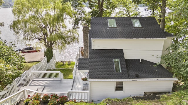 1795 Wolcott Rd, Wolcott, CT 06716 - rear view of house with roof with shingles, a chimney, and a deck