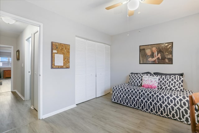 87 E Broadway Unit D, Milford, CT 06460 - bedroom with wood finished floors, a closet, and a ceiling fan