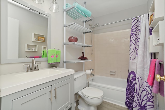 87 E Broadway Unit D, Milford, CT 06460 - full bathroom with toilet, vanity, and shower / bathtub combination with curtain