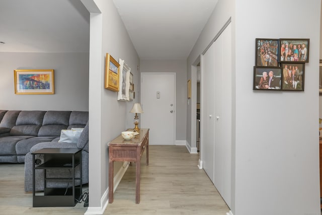 87 E Broadway Unit D, Milford, CT 06460 - corridor with light wood finished floors and baseboards