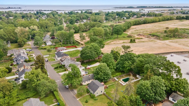 8 Maple Ave, Clinton, CT 06413 - aerial view of property and surrounding area with a nearby body of water and a tree filled landscape
