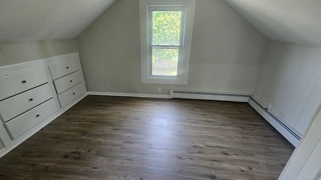82 Windsor St, Enfield, CT 06082 - additional living space featuring lofted ceiling, baseboard heating, and dark wood-style floors