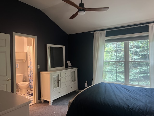 1006 Sienna Dr Unit 1006, Danbury, CT 06810 - carpeted bedroom featuring multiple windows, vaulted ceiling, ensuite bath, and a ceiling fan