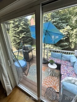 1006 Sienna Dr Unit 1006, Danbury, CT 06810 - doorway to outside with wood finished floors