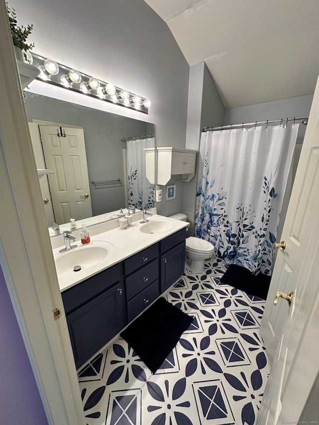 1006 Sienna Dr Unit 1006, Danbury, CT 06810 - bathroom featuring double vanity, toilet, lofted ceiling, and a shower with curtain