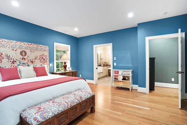 36 Fox Mdw, Marlborough, CT 06447 - bedroom with light wood finished floors, baseboards, recessed lighting, and ensuite bathroom