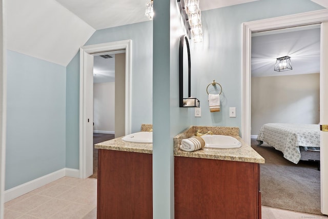 36 Fox Mdw, Marlborough, CT 06447 - ensuite bathroom featuring vanity, baseboards, and lofted ceiling