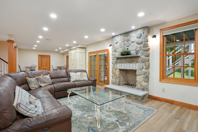 36 Fox Mdw, Marlborough, CT 06447 - living room with baseboards, wood finished floors, recessed lighting, decorative columns, and a stone fireplace