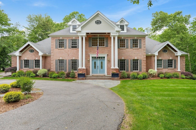 36 Fox Mdw, Marlborough, CT 06447 - neoclassical / greek revival house featuring a front lawn and brick siding