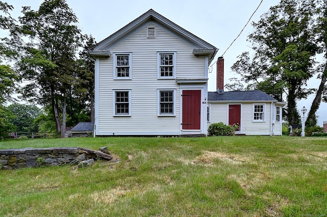 34 N Main St, Marlborough, CT 06447 - view of front facade featuring a chimney and a front lawn