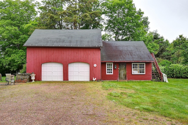 34 N Main St, Marlborough, CT 06447 - view of front of home with a front lawn, roof with shingles, and stairway