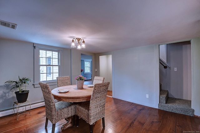 34 N Main St, Marlborough, CT 06447 - dining area featuring stairway, dark wood-style floors, a baseboard heating unit, and a chandelier