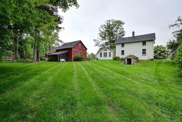 34 N Main St, Marlborough, CT 06447 - view of green lawn with a barn and an outbuilding