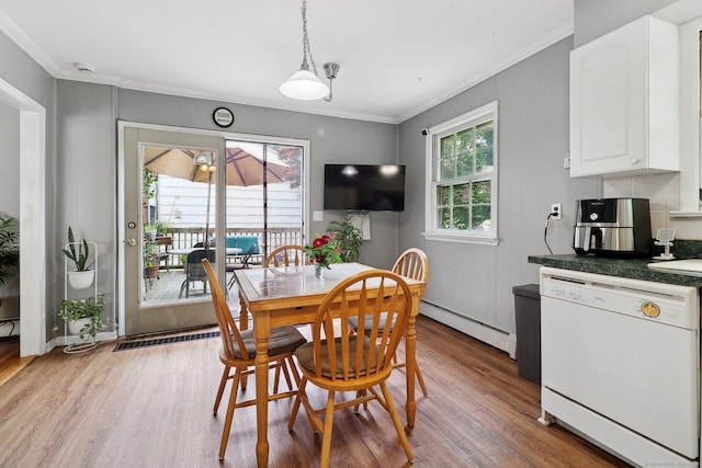17 Linden St, Norwalk, CT 06851 - dining room featuring a baseboard radiator, light wood-style floors, and crown molding