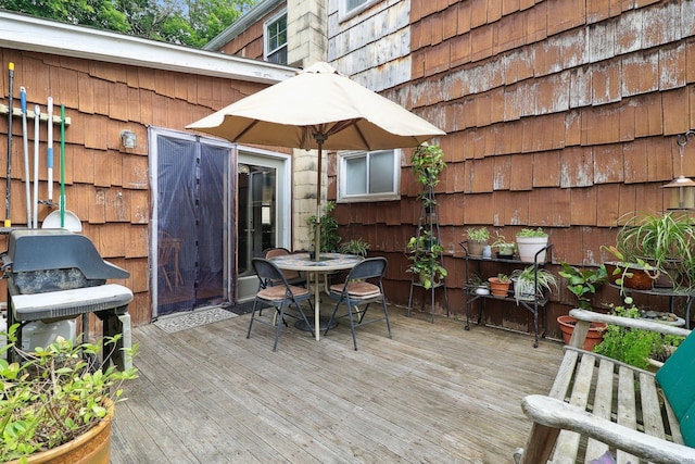 17 Linden St, Norwalk, CT 06851 - wooden terrace with outdoor dining area and grilling area