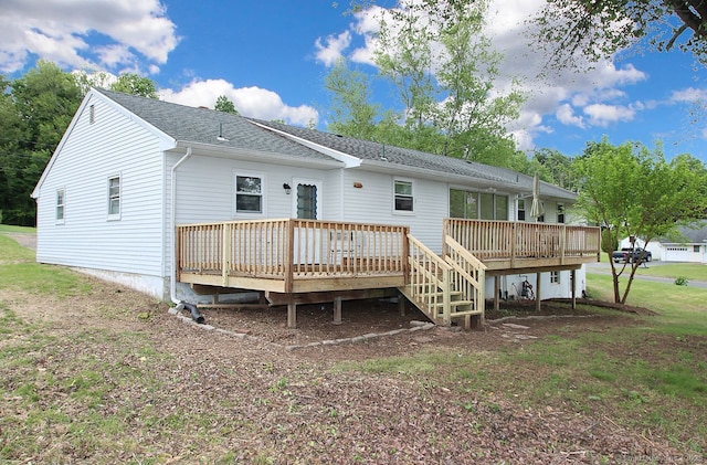65 Bayberry Dr, Wallingford, CT 06492 - back of property featuring a wooden deck and roof with shingles
