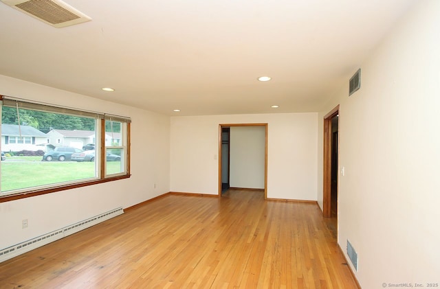 65 Bayberry Dr, Wallingford, CT 06492 - unfurnished room with baseboard heating, recessed lighting, light wood-style flooring, and baseboards