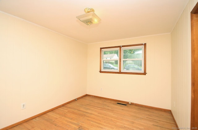 65 Bayberry Dr, Wallingford, CT 06492 - unfurnished room featuring light wood-style floors, baseboards, and ornamental molding
