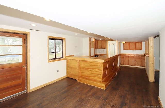 65 Bayberry Dr, Wallingford, CT 06492 - kitchen with a peninsula, dark wood-style floors, baseboards, recessed lighting, and light countertops