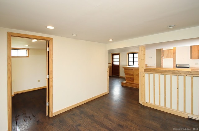 65 Bayberry Dr, Wallingford, CT 06492 - unfurnished living room with dark wood-style floors, recessed lighting, and baseboards