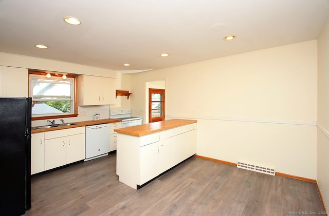 65 Bayberry Dr, Wallingford, CT 06492 - kitchen with white appliances, a sink, butcher block counters, white cabinets, and recessed lighting