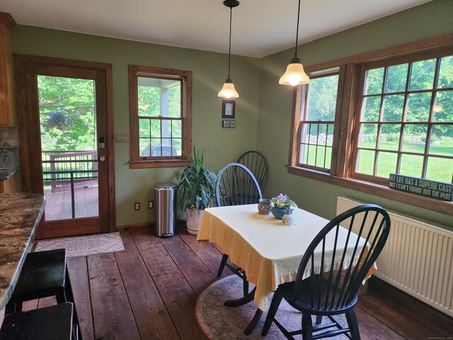 310 S Bigelow Rd, Hampton, CT 06247 - dining area featuring dark wood-style flooring and baseboards