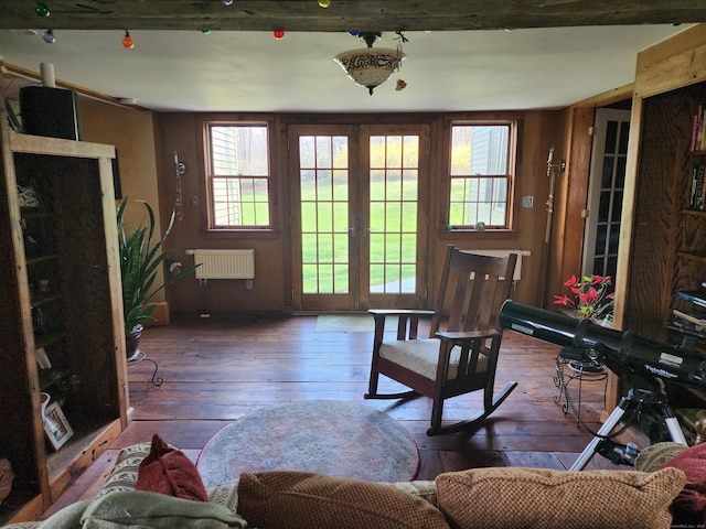 310 S Bigelow Rd, Hampton, CT 06247 - living area featuring radiator heating unit and hardwood / wood-style floors