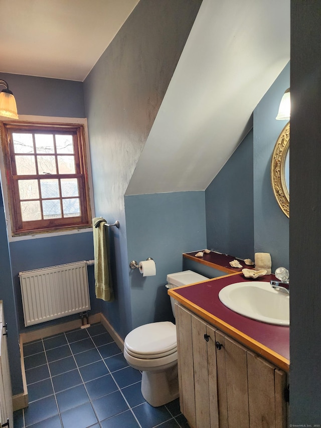 310 S Bigelow Rd, Hampton, CT 06247 - half bath with radiator, tile patterned flooring, vanity, and vaulted ceiling
